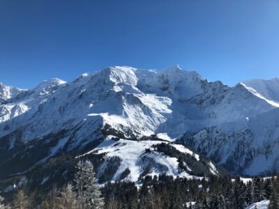 snow covered mountain under blue sky during daytime